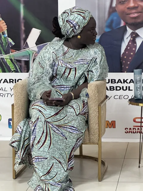 A seated portrait during the community event