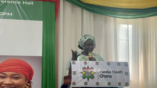 Speaking from the lectern during the programme